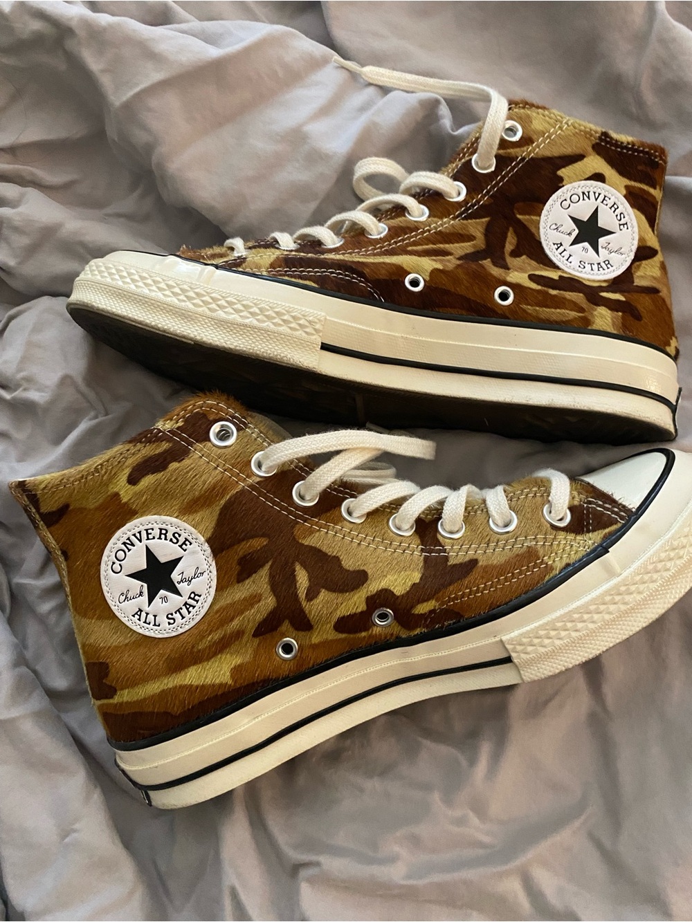Faux pony hair camo Converse hi-tops